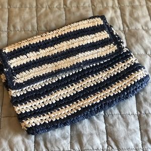Striped woven clutch